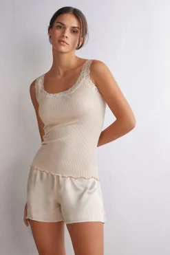 Camiseta de tirantes en seda con escote de encaje